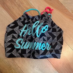 mint green and black swimsuit top